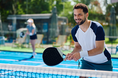 man playing pickleball
